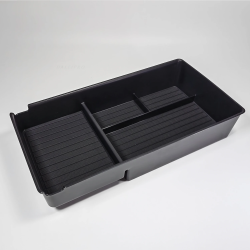 Under-armrest organizer for XPENG G9